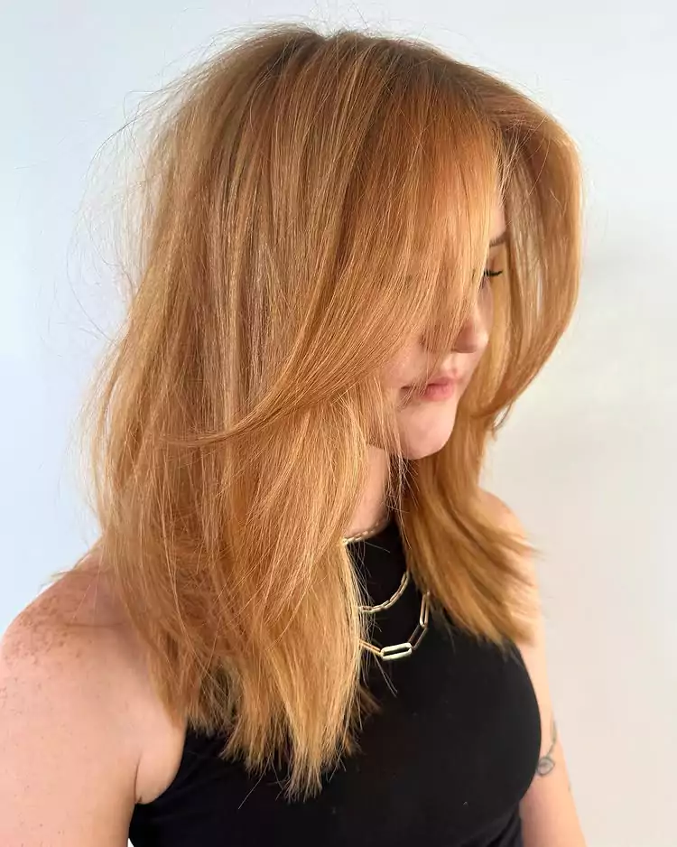 Feathered Strawberry Blonde Lob
