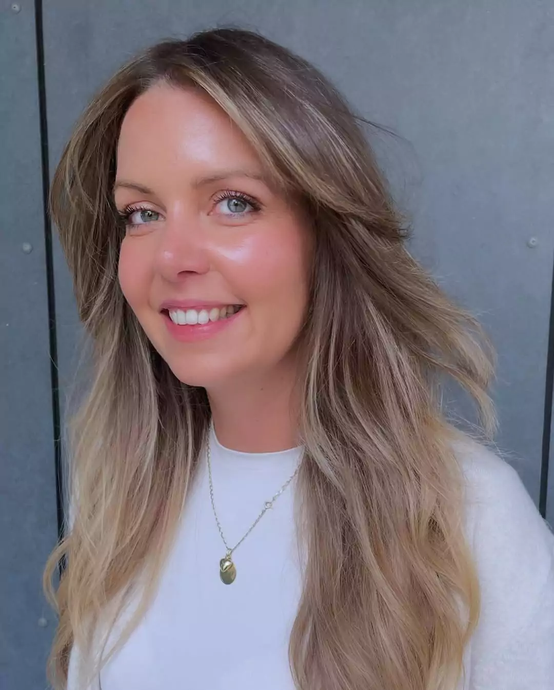 Long Layered Dark Blonde with Flipped Ends