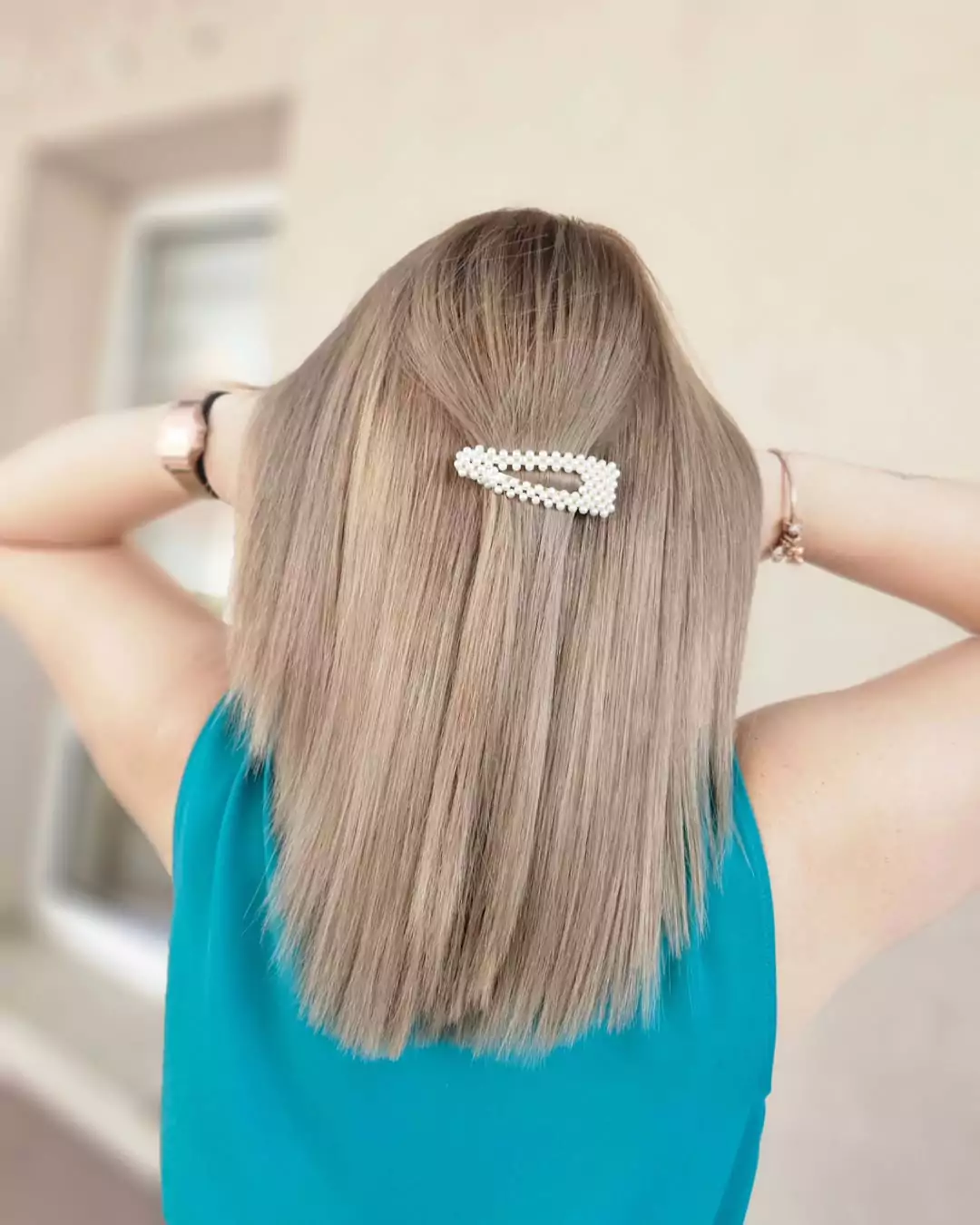 Pearl-Adorned Ash Blonde Lob