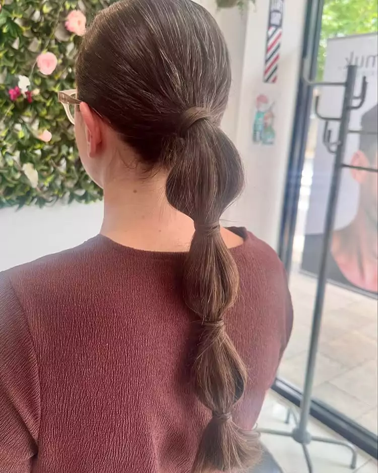 Sleek Bubble Ponytail with Multiple Hair Ties
