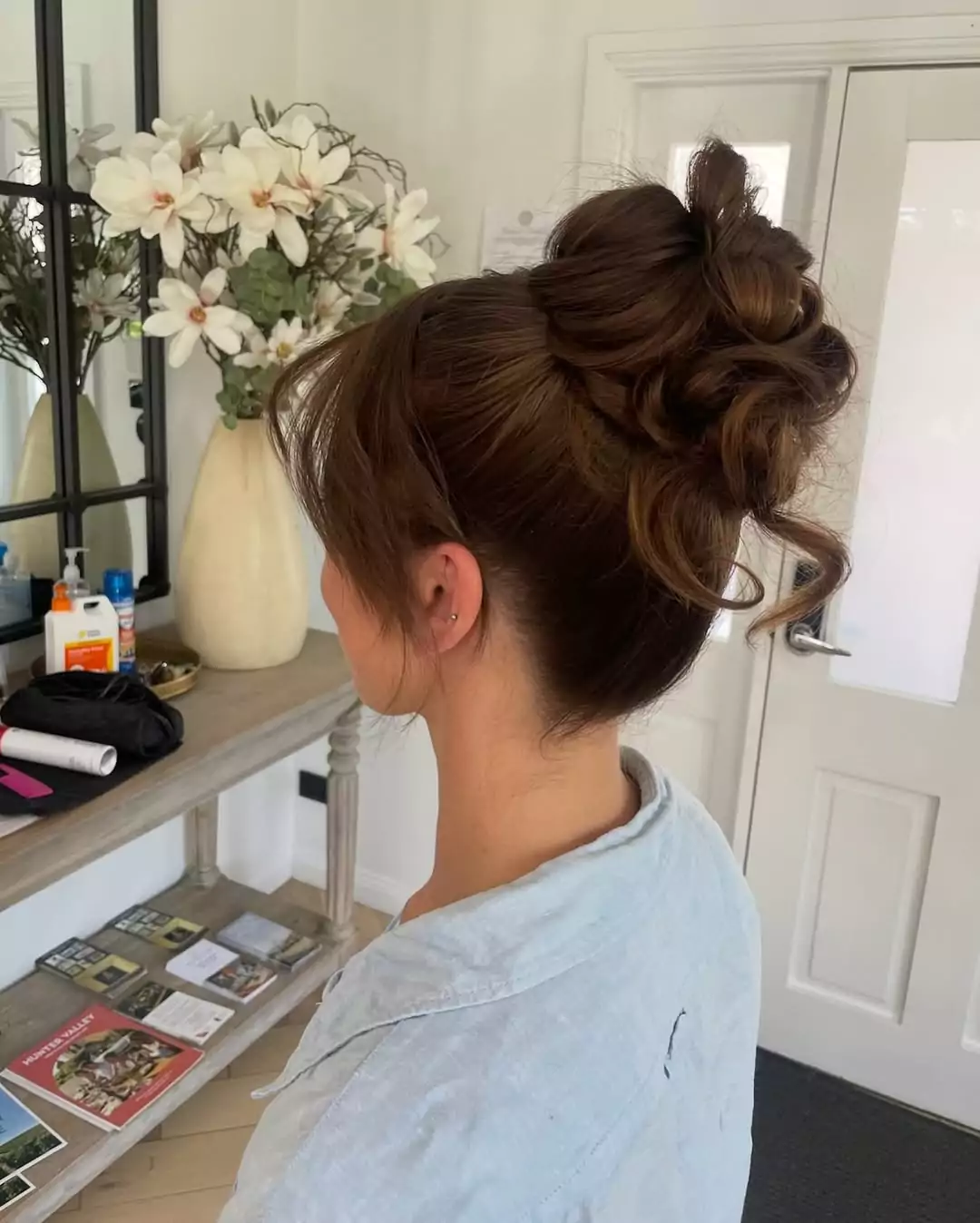 Textured Messy Bun with Face-Framing Pieces