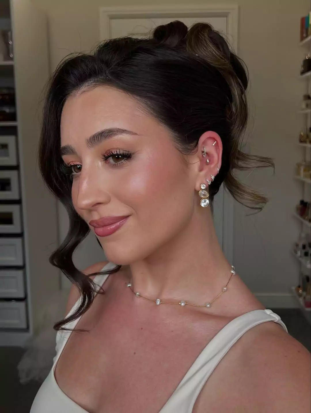 Voluminous Side-Swept Updo with Textured Crown