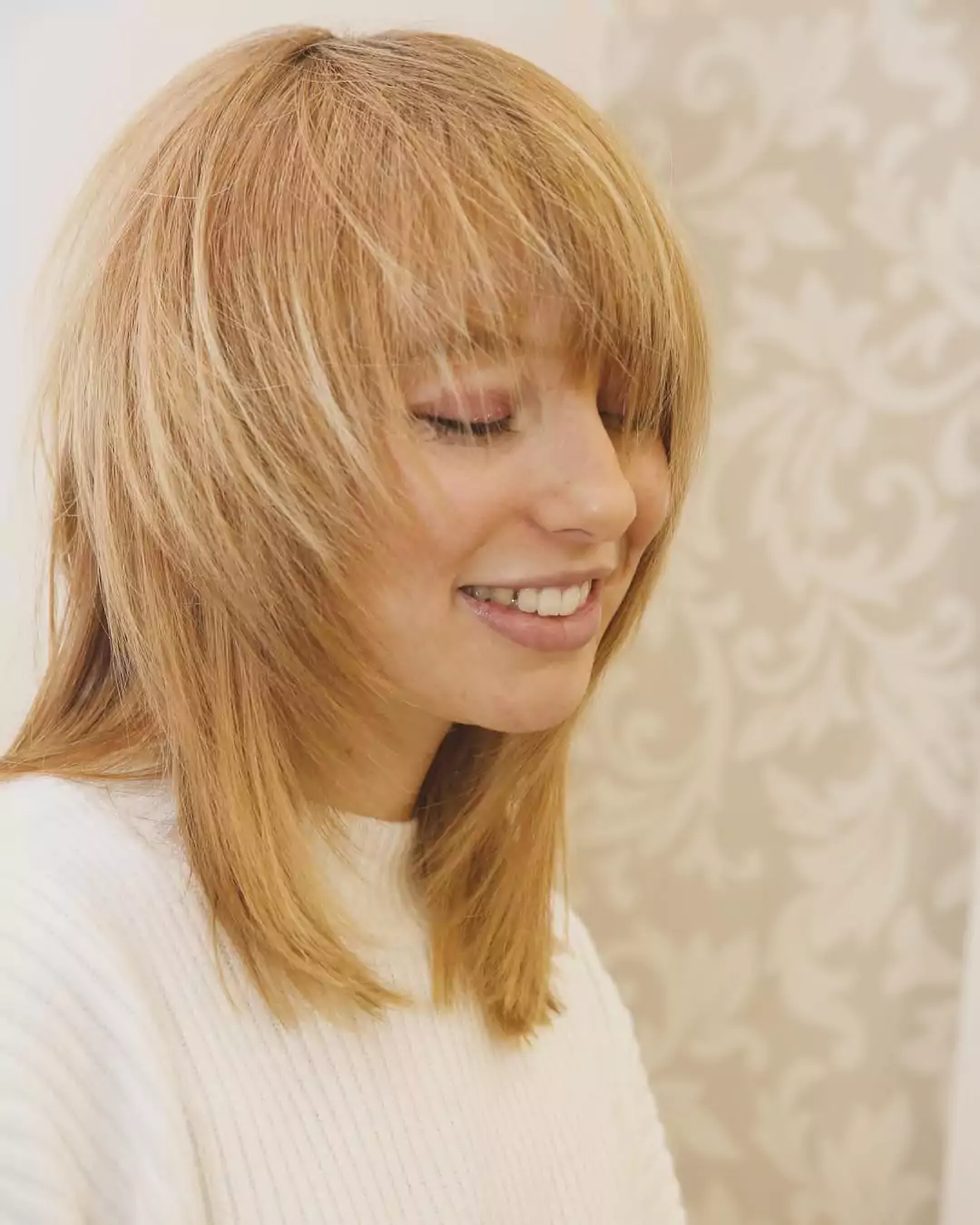 Layered Blonde Bob with Curtain Bangs